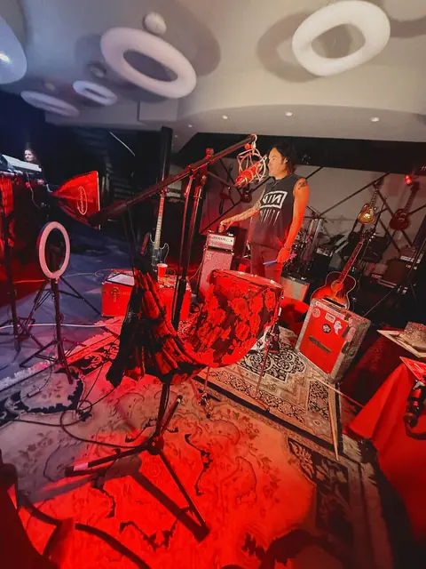 Dialing in amp tone during a session at Steelhorse